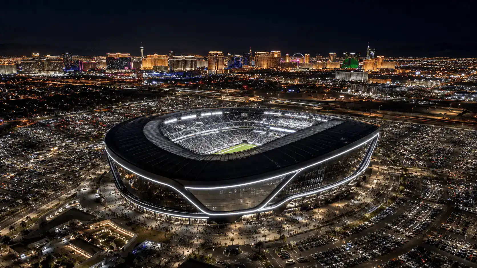 Allegiant Stadium Enterprise Nevada Raiders NFL Night Game Aerial View Strip Skyline