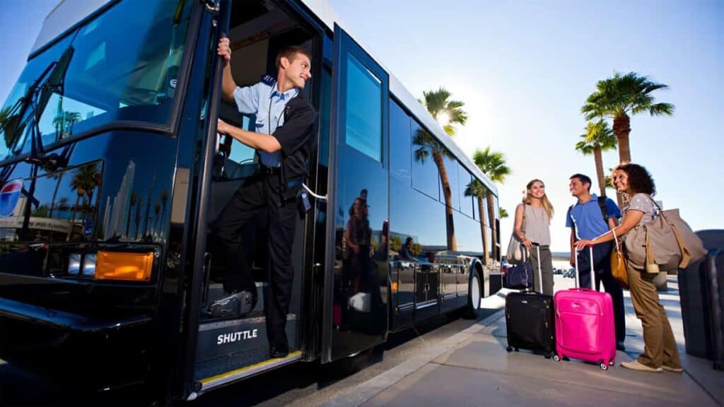Black Shuttle At Arrivals With Tourists