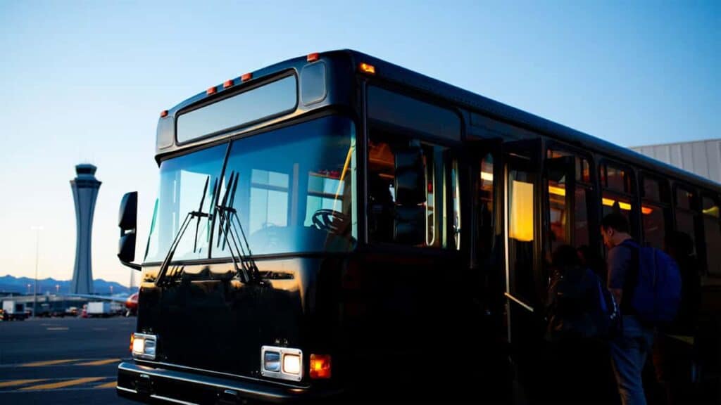 Black Shuttle With Passengers Boarding