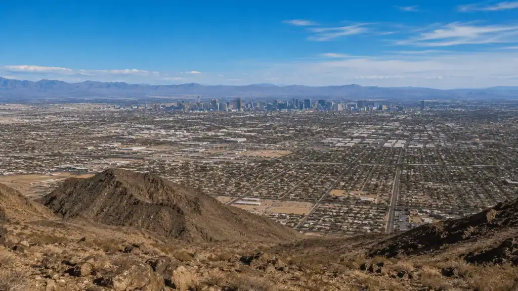 Panoramic daytime view from Frenchman Mountain in Sunrise Manor Nevada looking west across the Las Vegas Valley with the Strip visible in the distance