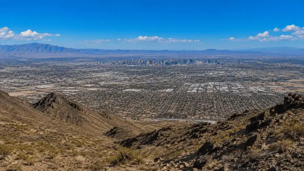 Panoramic daytime view from Frenchman Mountain in Sunrise Manor Nevada looking west across the Las Vegas Valley with the Strip visible in the distance