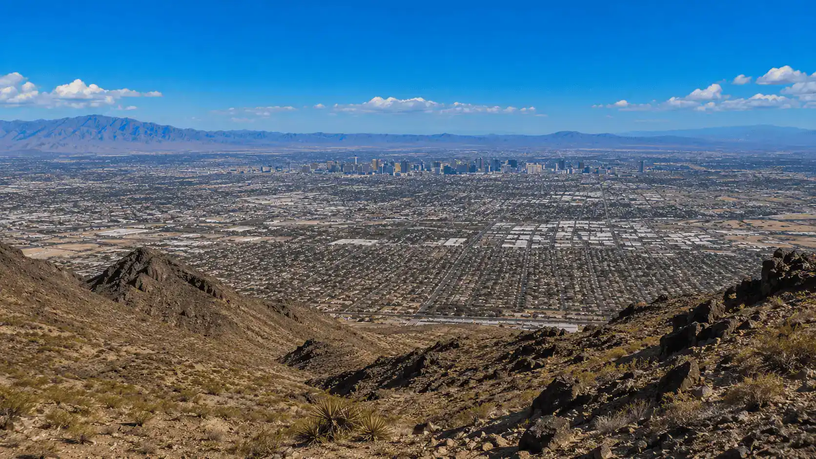 Panoramic daytime view from Frenchman Mountain in Sunrise Manor Nevada looking west across the Las Vegas Valley with the Strip visible in the distance