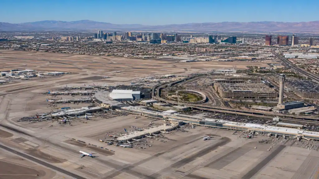 Harry Reid International Airport Las Las Vegas Aerial Daytime Terminals Runways Strip Skyline