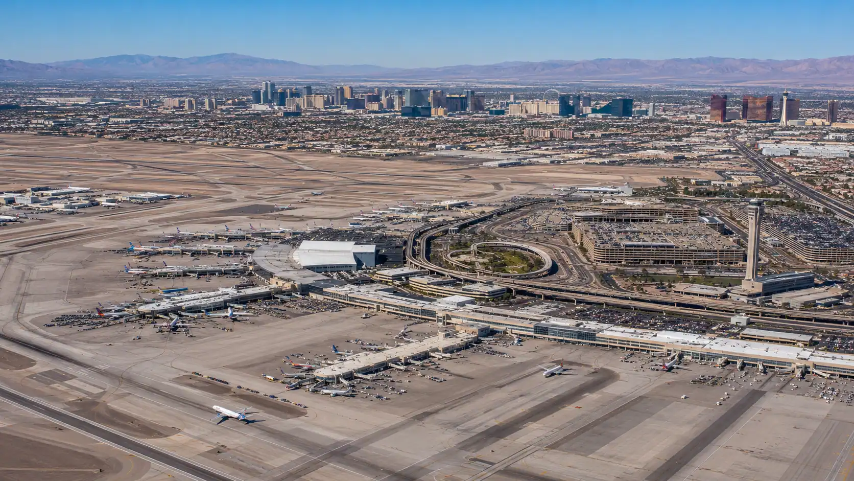 Harry Reid International Airport Las Las Vegas Aerial Daytime Terminals Runways Strip Skyline