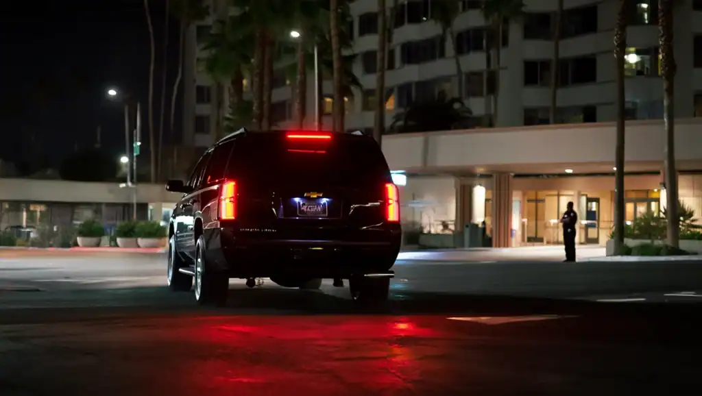 Personal Sedan Services Suv Departing Hospital After Dropping Off Organ