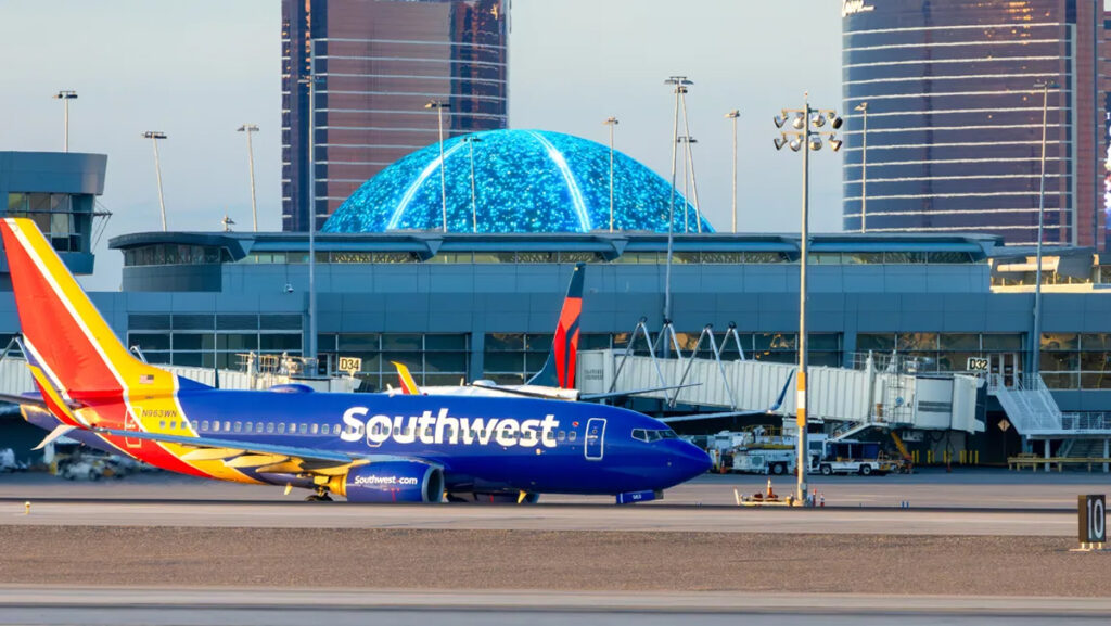 Southwest Airlines At Las Vegas Airport With Sphere In Background