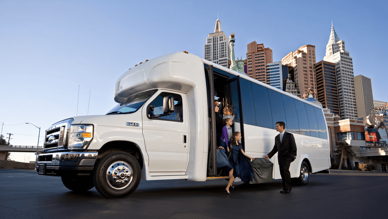 Black Ford E-450 shuttle bus dropping guests off in Las Vegas at New York-New York - Personal Sedan Services