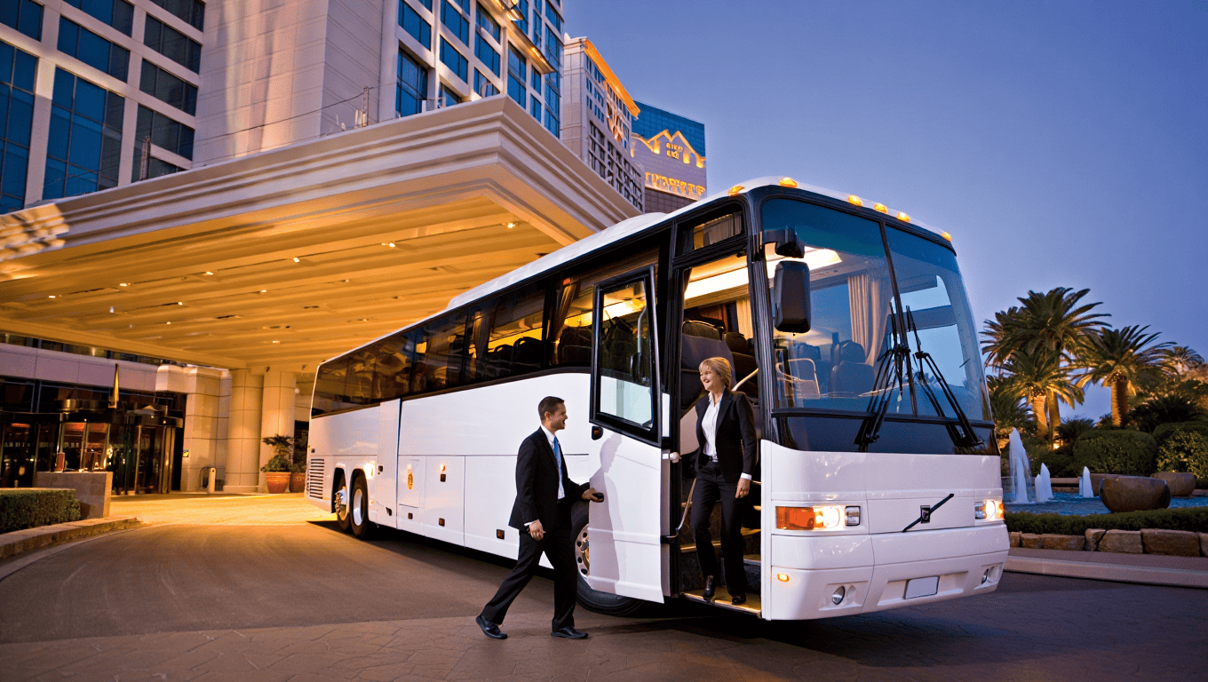 Volvo 9700 Charter Bus dropping a group at the Fontainebleau Hotel in Las Vegas - Personal Sedan Services
