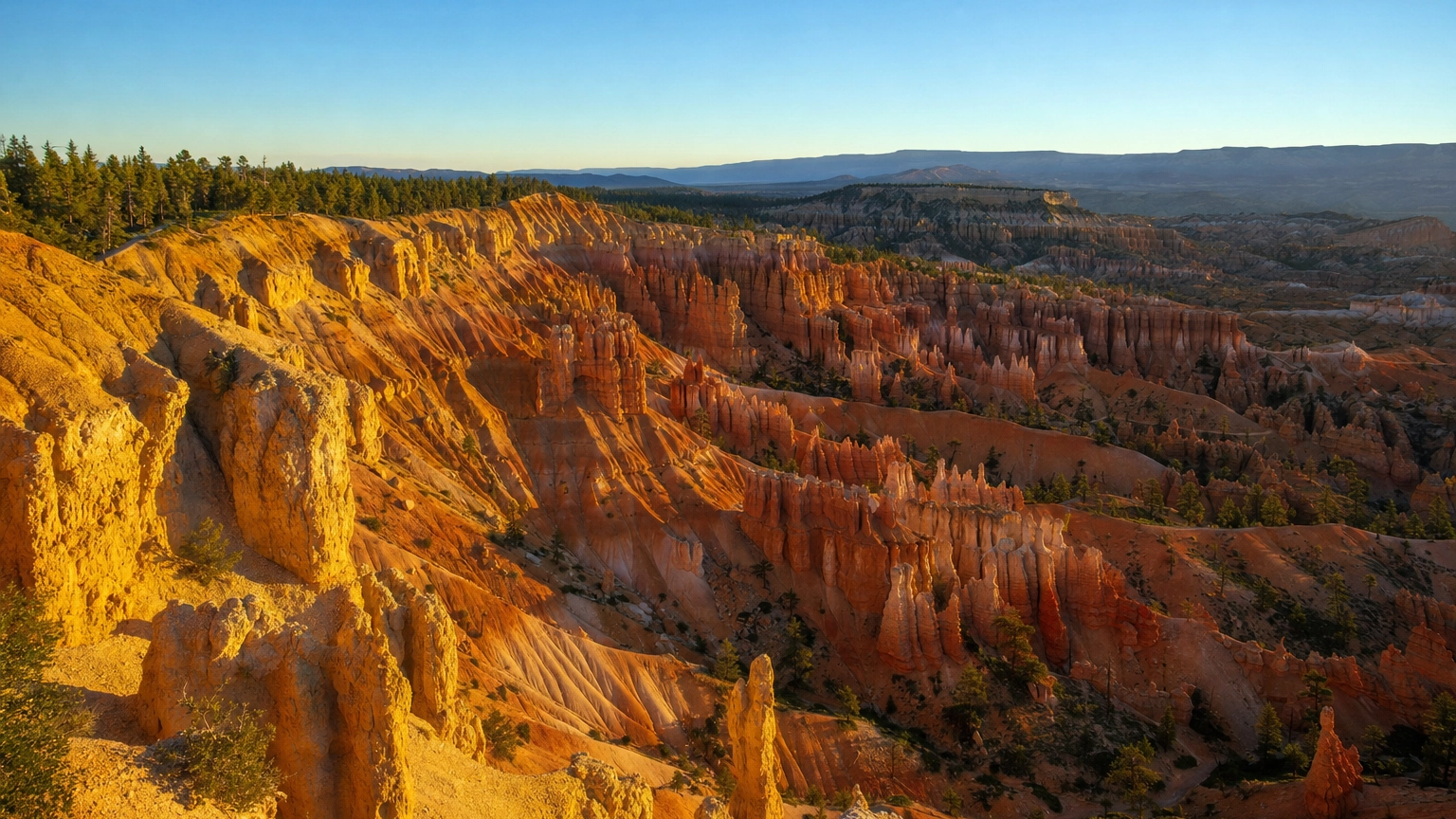 Thousands of glowing orange and white hoodoo spires in the Bryce Canyon amphitheater at sunrise near Las Vegas